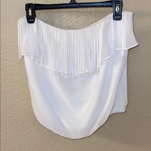 Cute white Bebe off shoulder top with tassels